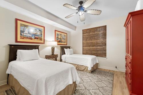 Ένα ή περισσότερα κρεβάτια σε δωμάτιο στο Beach Colony East 8B