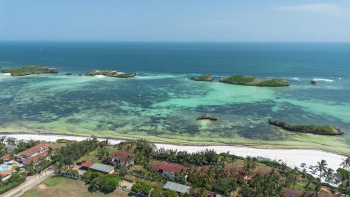 an aerial view of the islands in the ocean at Rafiki Tamu Residential Resort in Watamu
