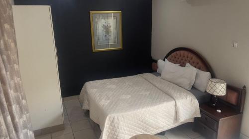 Кровать или кровати в номере 221 Guesthouse