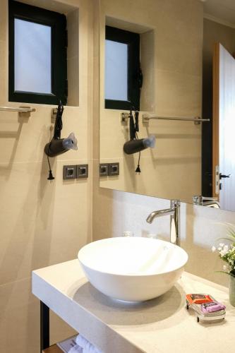 Un baño de Arocaria Apartments