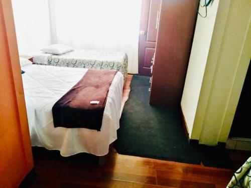 Ein Bett oder Betten in einem Zimmer der Unterkunft OROSHEAM