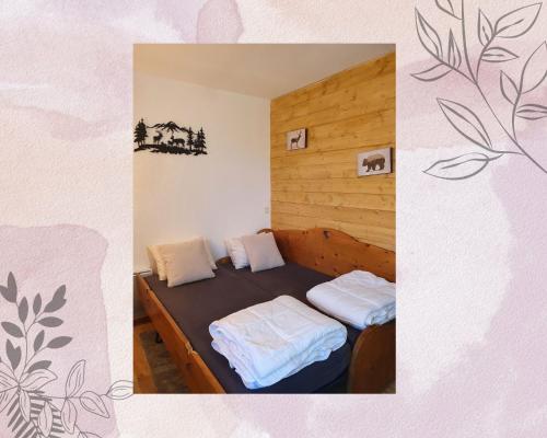 Cette petite chambre comprend 2 lits. dans l'établissement Bel Appartement cosy 7 pers à Valmeinier 1800, à Valmeinier