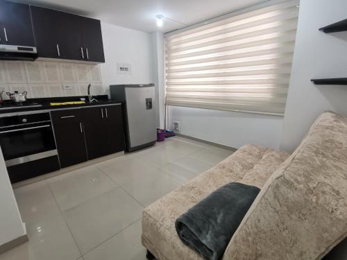 Küche/Küchenzeile in der Unterkunft Aparta-estudio centro cerca plaza de bolívar Tunja