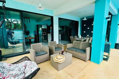 Χώρος καθιστικού στο Villa turquoise Exotique