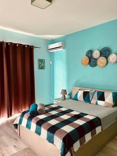 Ένα ή περισσότερα κρεβάτια σε δωμάτιο στο Villa turquoise Exotique