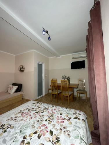 Postel nebo postele na pokoji v ubytování Apartmani Simona