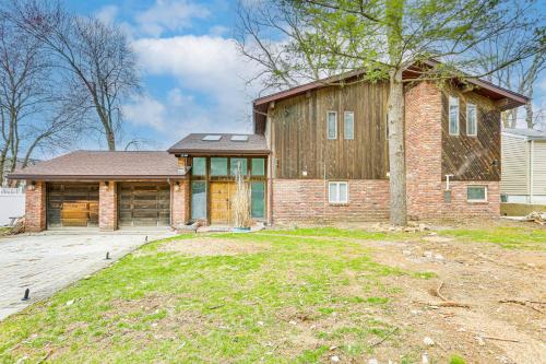 a large brick house with a large yard at Waterfront Lake Hopatcong Home with Boat Dock! in Mount Arlington