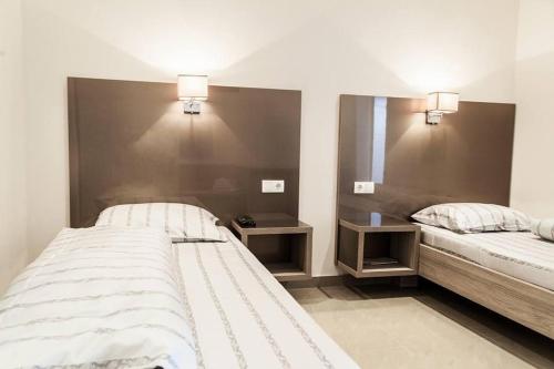 Cama o camas de una habitación en Hotel Rođo