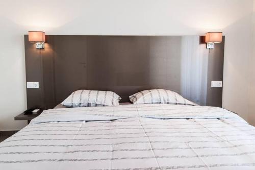 Cama o camas de una habitación en Hotel Rođo