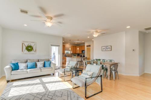 a living room with a couch and chairs and a table at Seabrook Getaway with Balconies and Bay Views! in Seabrook