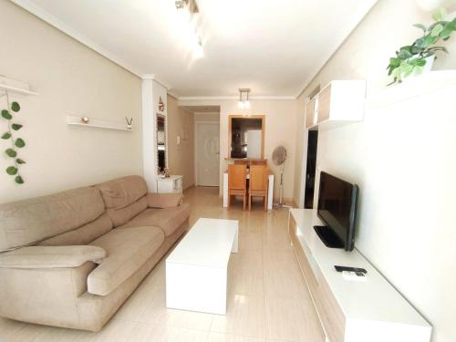 TV a/nebo společenská místnost v ubytování Edificio Costa Azahar II