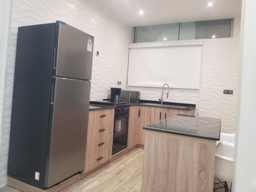 Una cocina o cocineta en Appartement à Cotonou