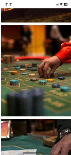 a person playing a board game on a poker table at Domina coral bay resort in Sharm El Sheikh