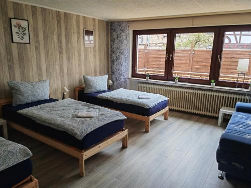 Ένα ή περισσότερα κρεβάτια σε δωμάτιο στο Sany's Apartments