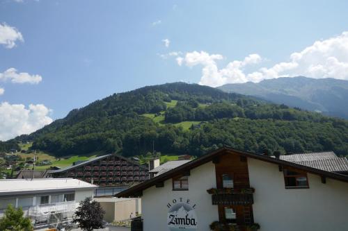 a town with a mountain in the background at Apartment Sonnenlicht in Schruns-Tschagguns