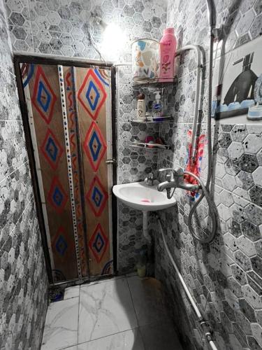 a bathroom with a shower and a sink at Dar Ghita Medina in Rabat