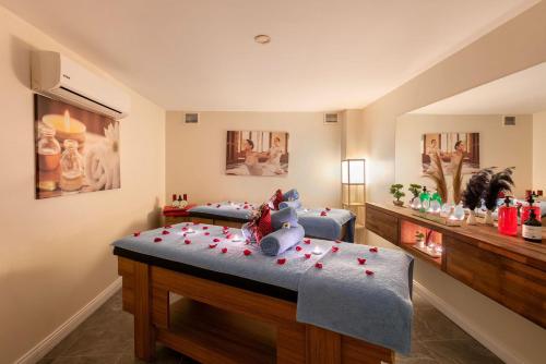 a room with two beds with hearts on the floor at Azuu Boutique Hotel in Antalya