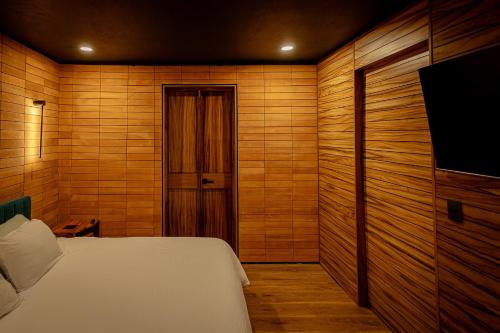 Una cama o camas en una habitación de Casa Ann Loft Marakame