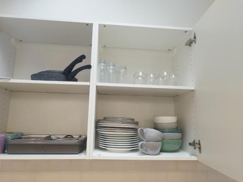 Küche/Küchenzeile in der Unterkunft Spacieux appartement proche de Paris Stade de France Métro