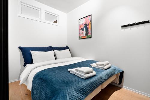 Postel nebo postele na pokoji v ubytování ARCTIC HOMES - Premium City Lounge