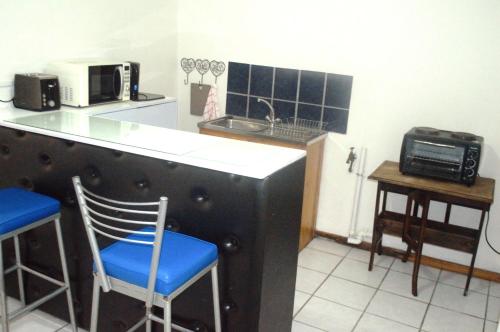 Η κουζίνα ή μικρή κουζίνα στο Imani Guest House