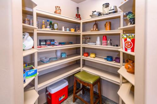 a walk in pantry with a chair and stool at Cozy Cactus Inn in Sedona