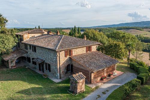 an aerial view of a large stone house at Villa Palazzo Bello con piscina e AC - Cetona in Cetona
