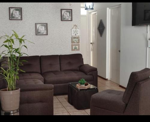 Posezení v ubytování Departamento en Pimentel