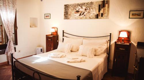 A bed or beds in a room at Nature & Relax in Tuscany - Fresco 2