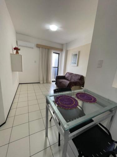 Ruang duduk di Flat Biarritz Próximo a Praia - Fonseca Imóveis