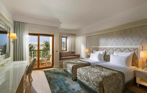Kaya Artemis Resort & Casinoにあるベッド