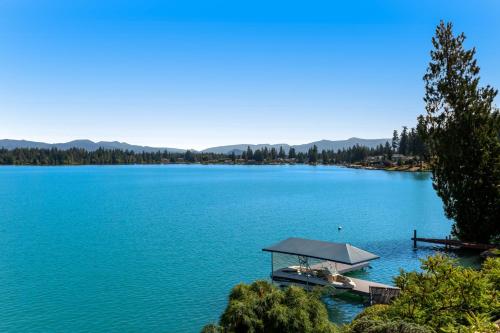 a dock in the middle of a large lake at Zen Oasis On Lake Tapps in Sumner