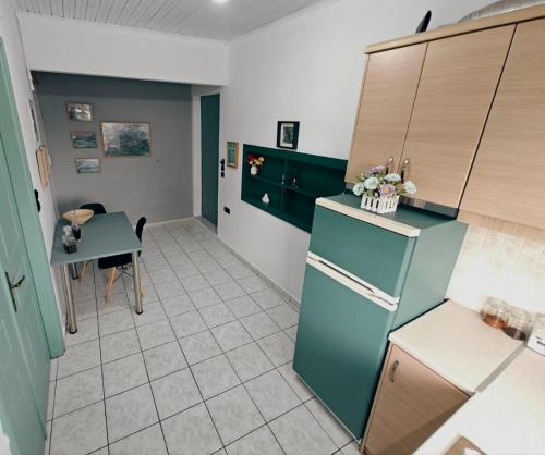Η κουζίνα ή μικρή κουζίνα στο ELVAJO Apartment