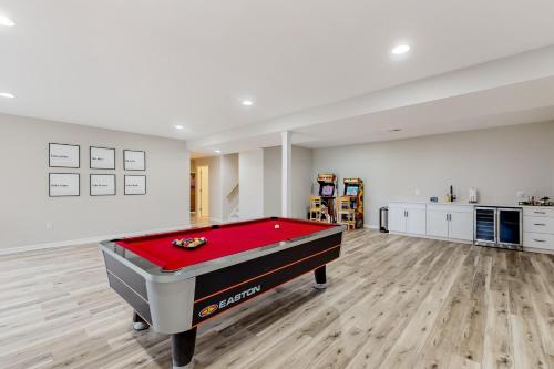 a living room with a pool table in it at Pleasants View in Bumpass