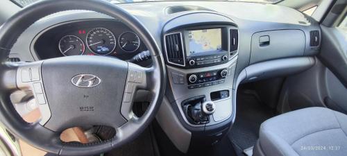 a dashboard of a car with a steering wheel at Macaronesia Campervan in Costa Del Silencio