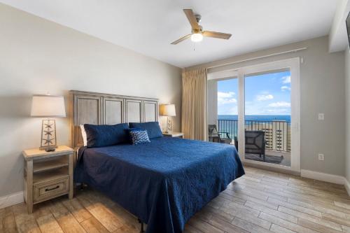 A bed or beds in a room at Laketown Wharf #1411 by Nautical Properties