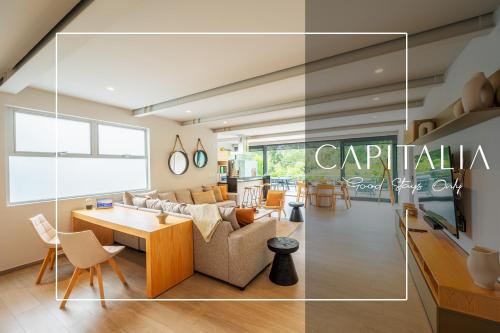 Capitalia - Luxury Apartments - Polanco - Alejandro Dumas في مدينة ميكسيكو: غرفة معيشة مع أريكة وطاولة