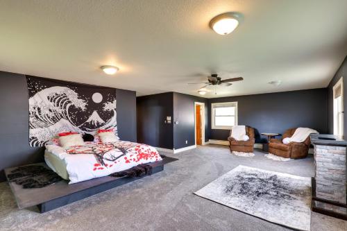 a bedroom with a bed with a painting on the wall at The 9th Green in Colorado Springs