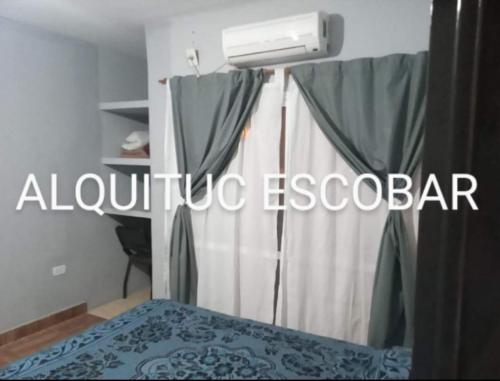Ένα ή περισσότερα κρεβάτια σε δωμάτιο στο ALQUITUC ESCOBAR II