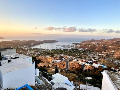 an aerial view of a town and a body of water at School House with Panoramic View in Serifos Chora