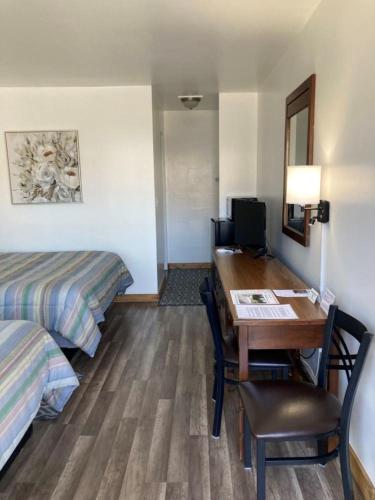 Μια τηλεόραση ή/και κέντρο ψυχαγωγίας στο John Day Motel