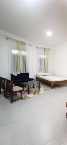 Cool Breeze Lodge and Cafe - Camera Familiare Con Terrazza