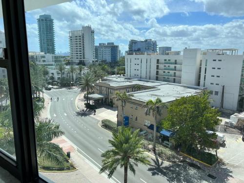 a view from a window of a city street with buildings at Ocean Front Units at Miami Beach in Miami Beach