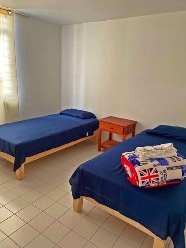 Katil atau katil-katil dalam bilik di Departamento en Naciones Unidas a 5 mins de Andares