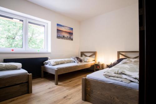Postel nebo postele na pokoji v ubytování chalupa na klidu
