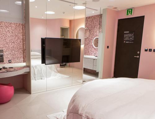 TV a/nebo společenská místnost v ubytování All-Ur Boutique Motel - Xinzhuang Branch