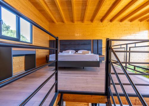 a bedroom in a house with a bed in it at La Veranda Villas in Kumluca