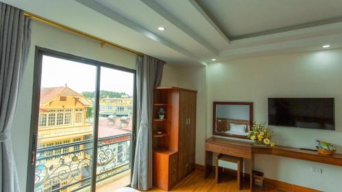 TV a/nebo společenská místnost v ubytování PHÚC HƯNG HOTEL