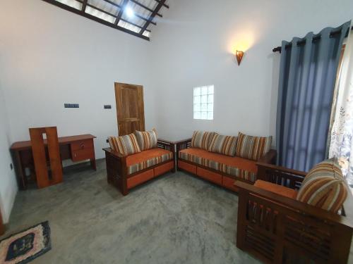 Χώρος καθιστικού στο Mirissa Surf Villa
