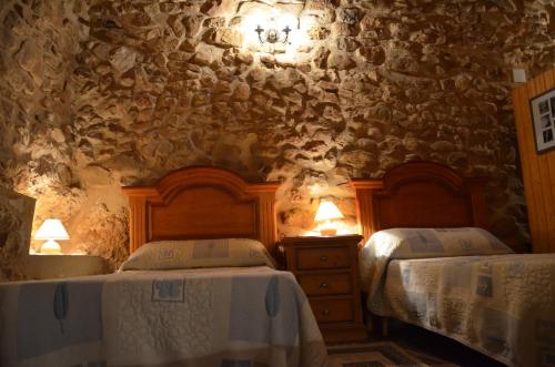 Postel nebo postele na pokoji v ubytování CASA EL CORRAL